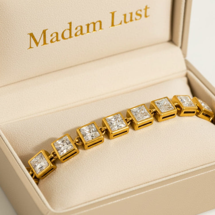 Madam Lust 18K gold-plated link bracelets from The Aura Chain collection, showcasing a high-shine finish and fluid architectural design.