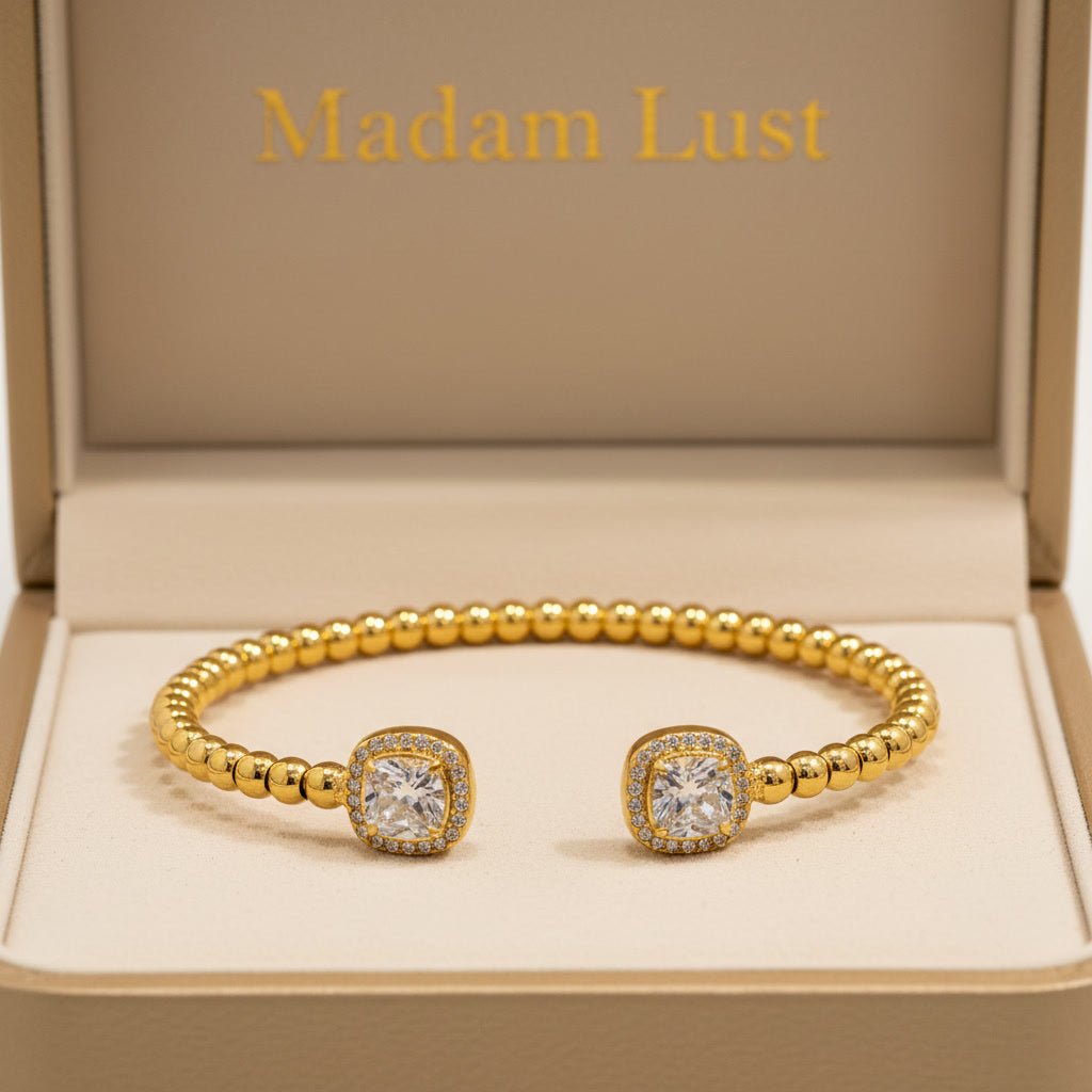 The Muse Bangle | 18K Gold Camellia CZ Bangle